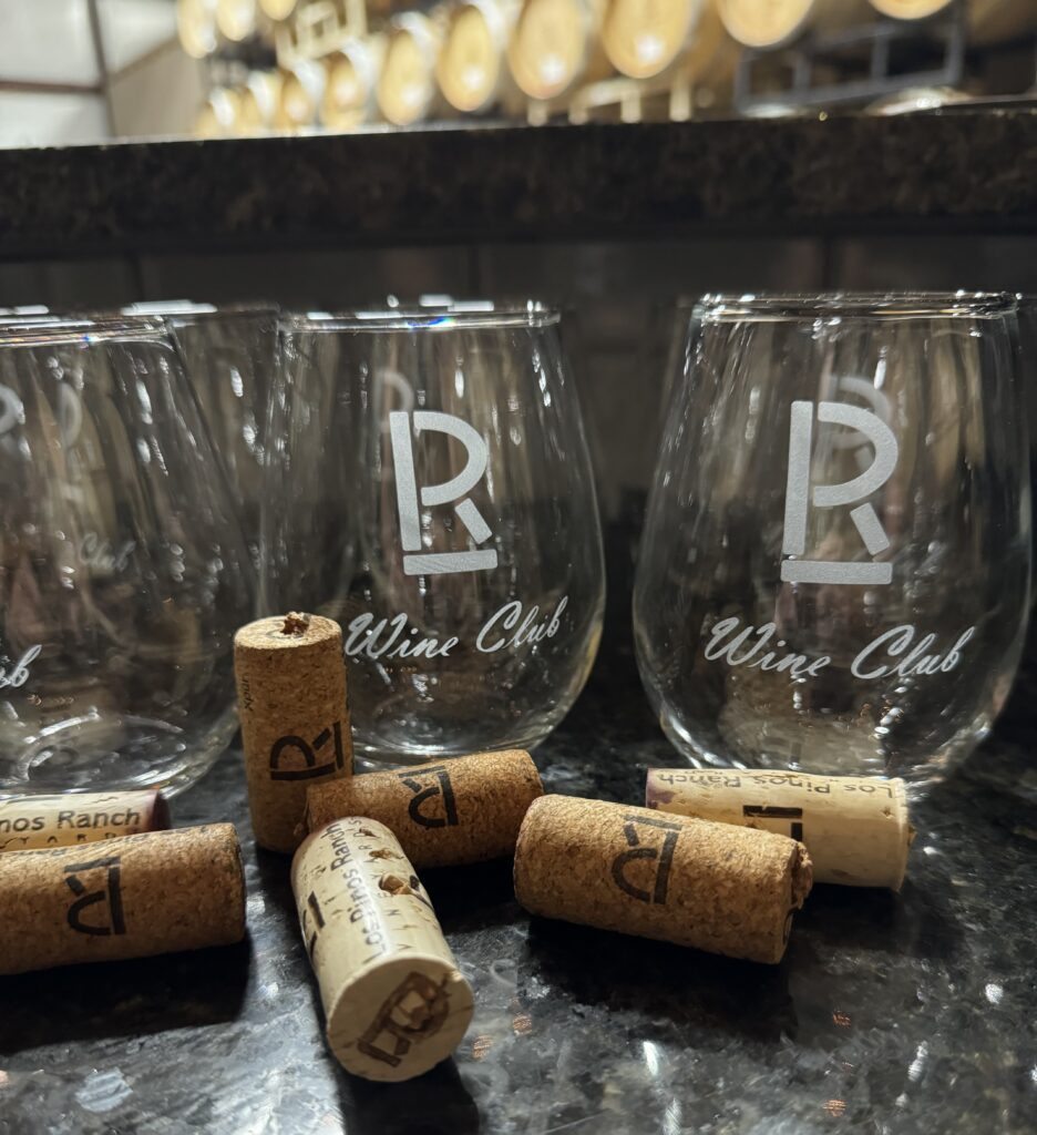 Picture of wine club glasses and corks